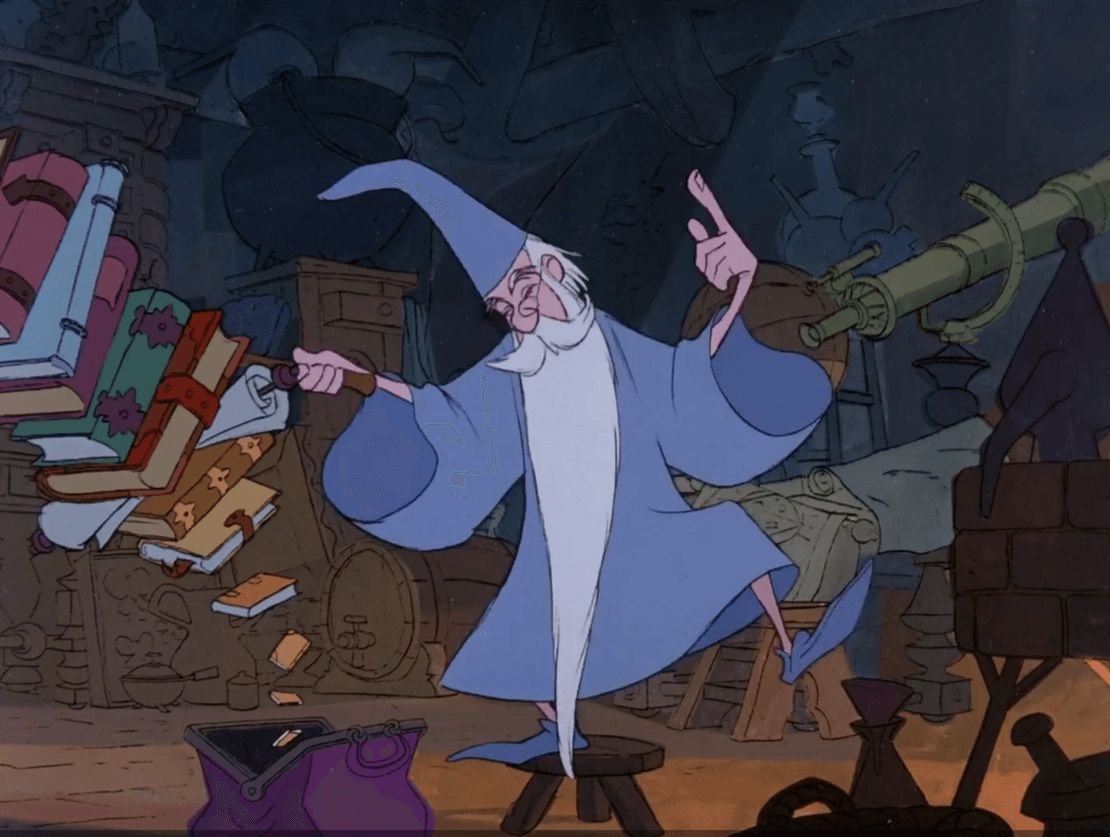 A screenshot from the animated Disney classic "The Sword in the Stone" wherein Merlin casts a spell to pack all his personal affects into his large luggage.